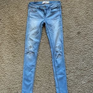 Hollister Distressed Low Rise Light Wash Jean with Rhinestone and Metal Detail
